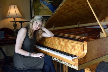 Busy calendar: Fiona Joy with her much-loved Stuart & Sons concert grand piano.